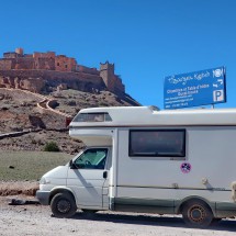 Our camper with the walled, castle like mountain village Tizourgane